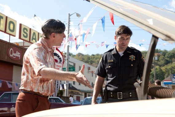 Left to right: Dan Castellaneta plays Izzy and Kyle Chandler plays Jackson Lamb in SUPER 8, from Paramount Pictures. Photo credit: François Duhamel © 2011 Paramount Pictures. All Rights Reserved.